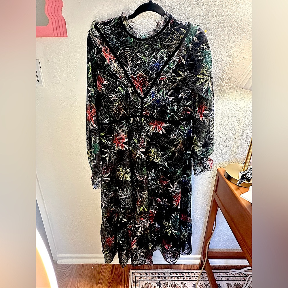 Gemma Albright dress. Long sleeve high neck dress. Zipper closure on the back.